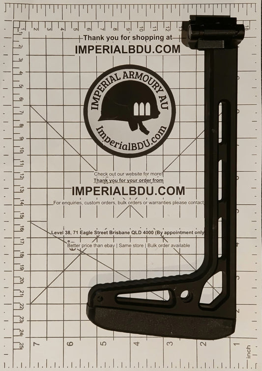 A black MCX MPX folding stock adjustable rifle stock buttstock with a sling attachment, displayed on a white grid measurement mat with Imperial BDU branding.