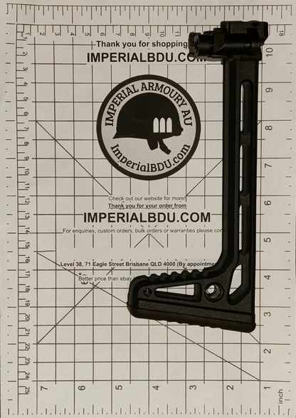 A black MCX MPX folding stock adjustable rifle stock buttstock with a sling attachment, displayed on a white grid measurement mat with Imperial BDU branding.