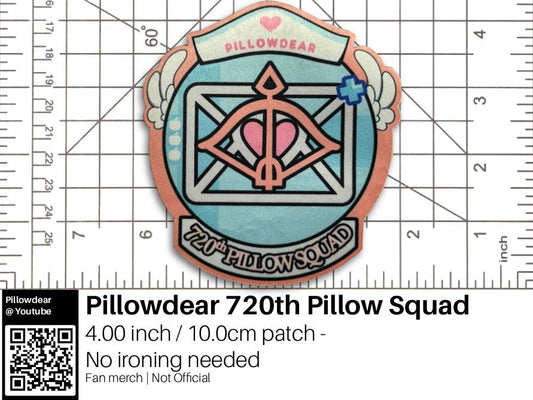 Decorative patch with 'Pillowdear 720th Pillow Squad' design on a ruler background